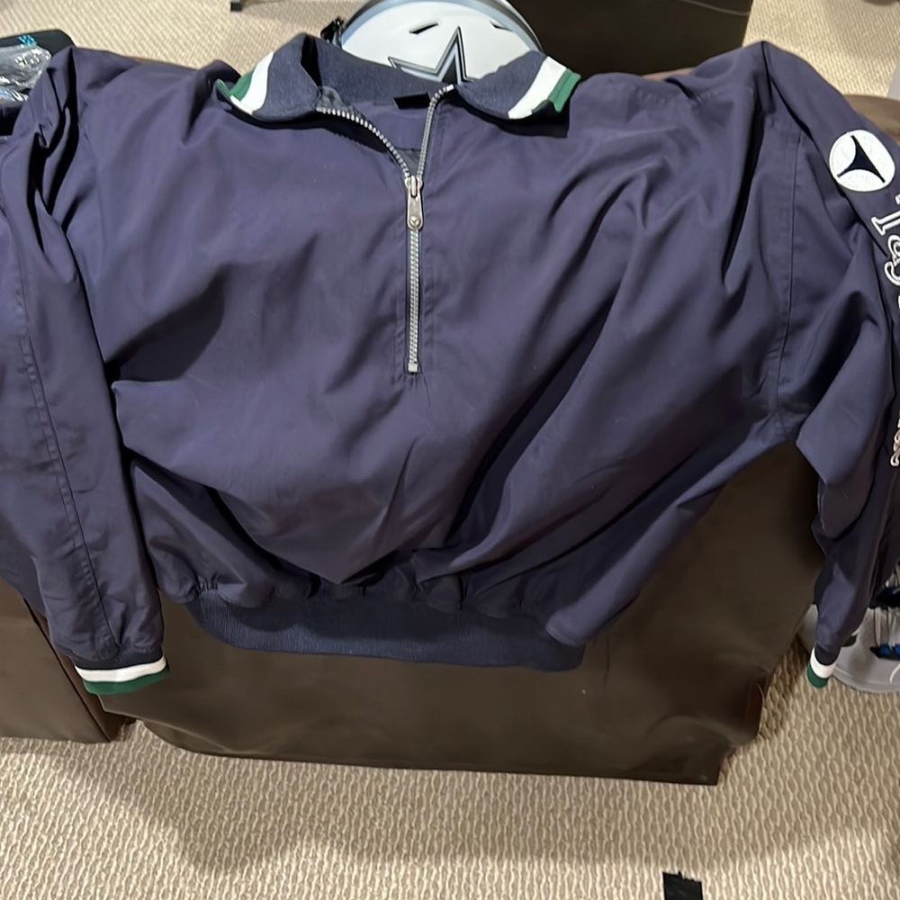 Mens 3/4 zip over the head golf wind breaker jacket.